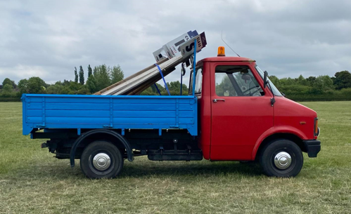 Red blue truck side