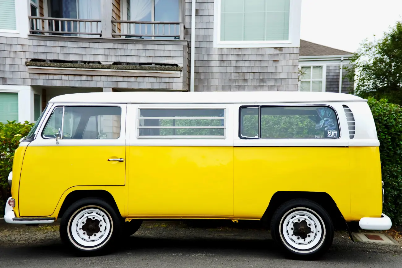 yellow volkswagen campervan