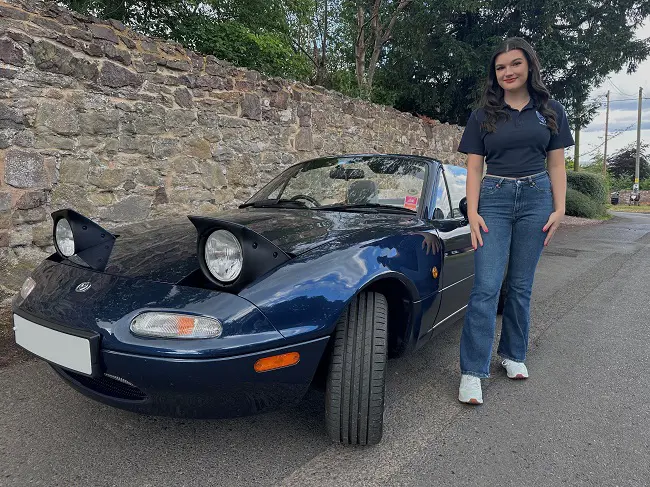 Person next to car