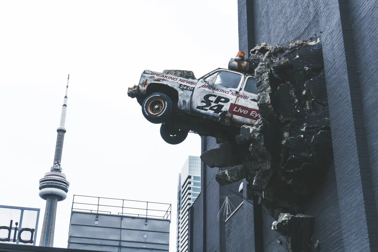 Rally car coming out of wall