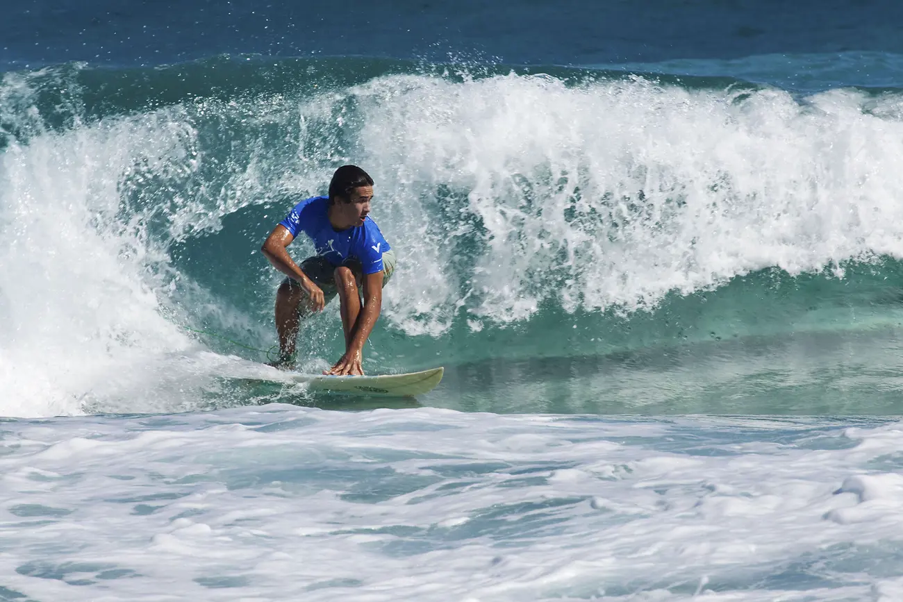 A man Surfing on a wave