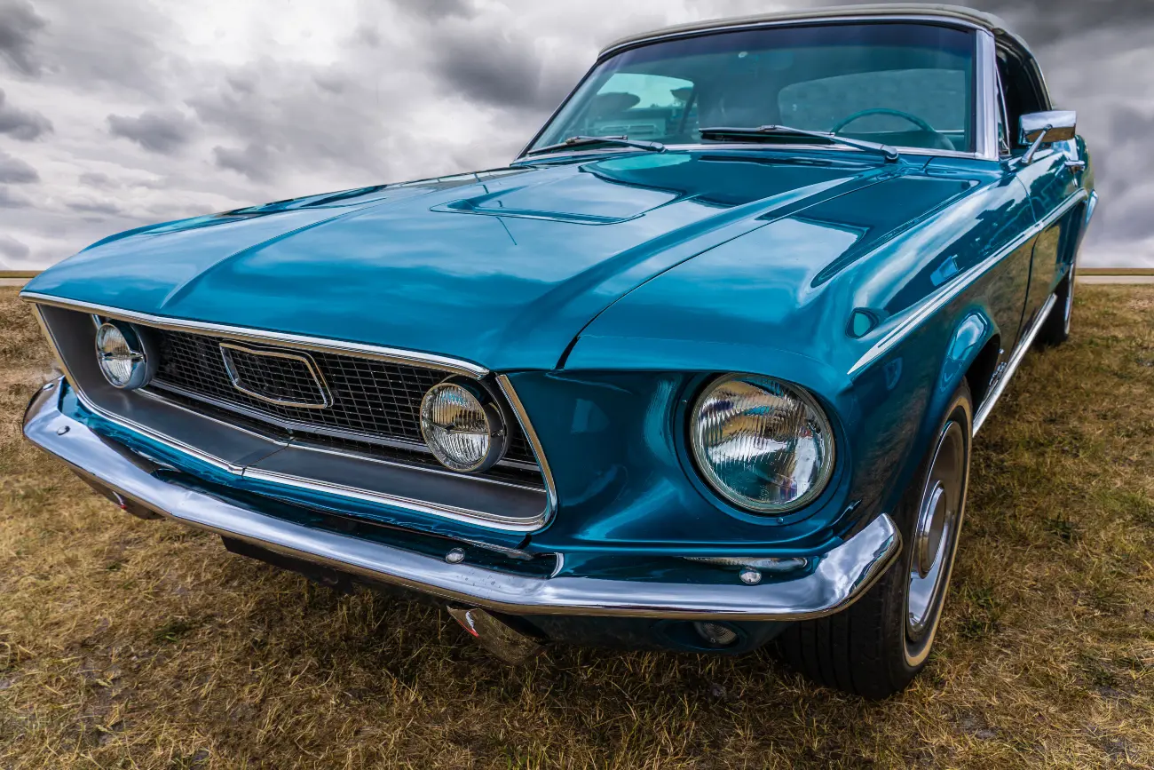 rearview pic of classic blue sports car