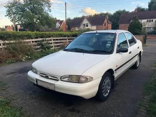 White Ford Mondeo on drive