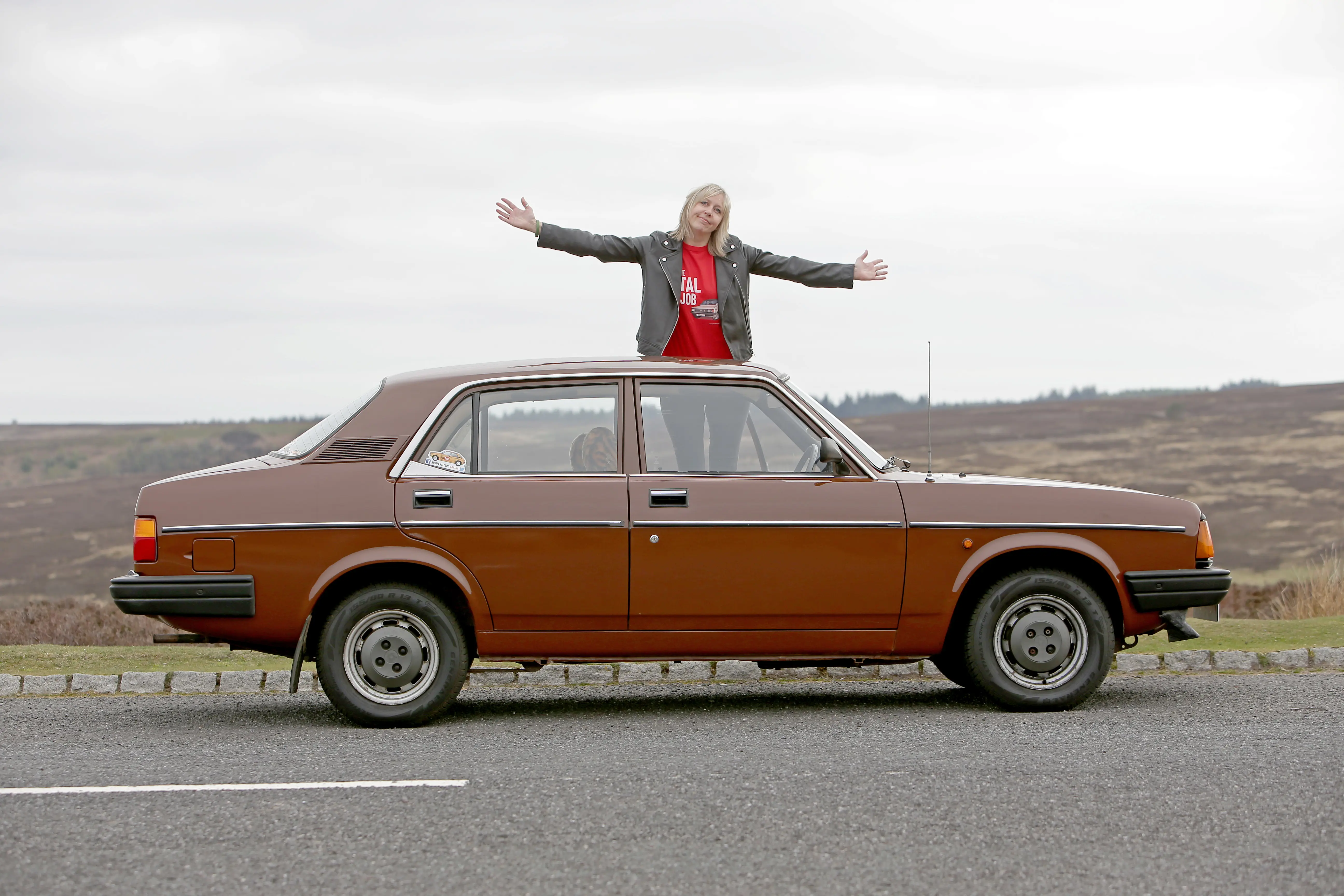 Woman on car