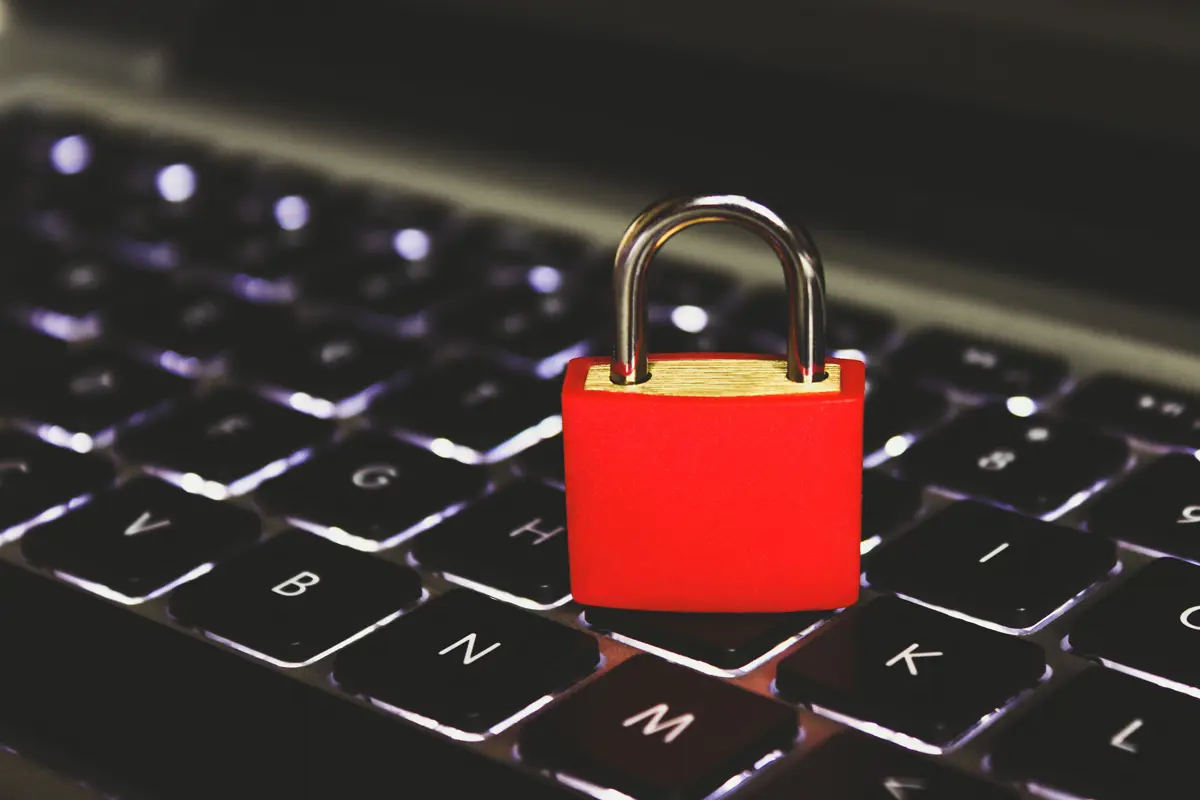 A padlock placed on a laptop keyboard