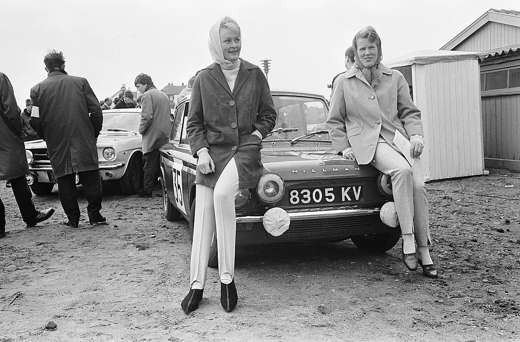 Women sat on car
