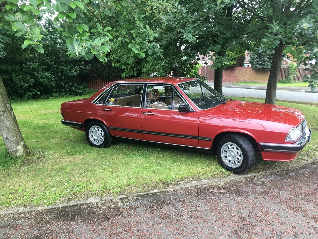 Red car on grass
